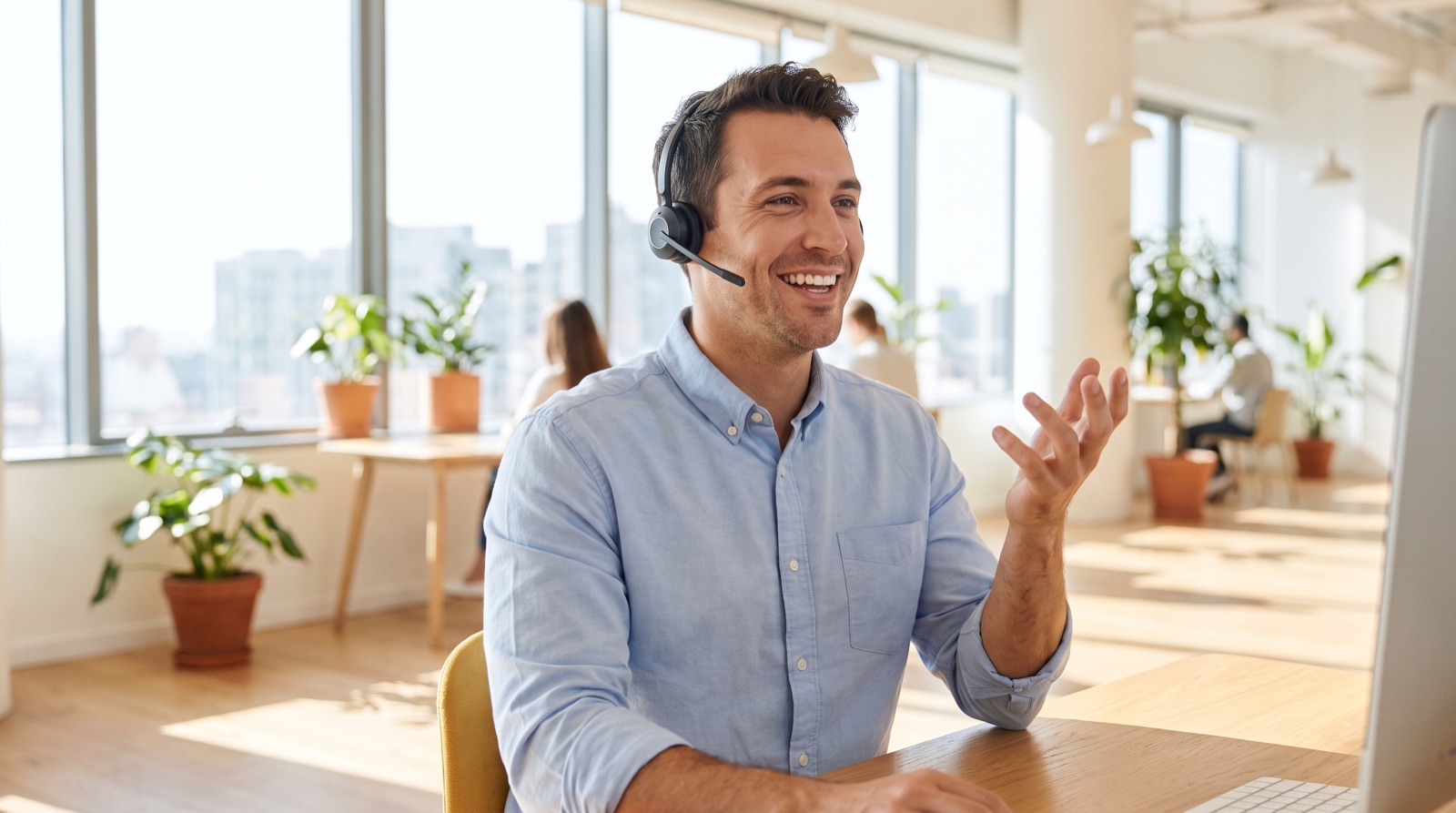 A specialist on a headset in a bright office